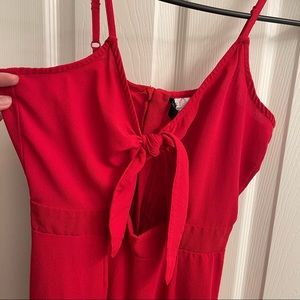 Red Jumpsuit with knot tie in the Middle